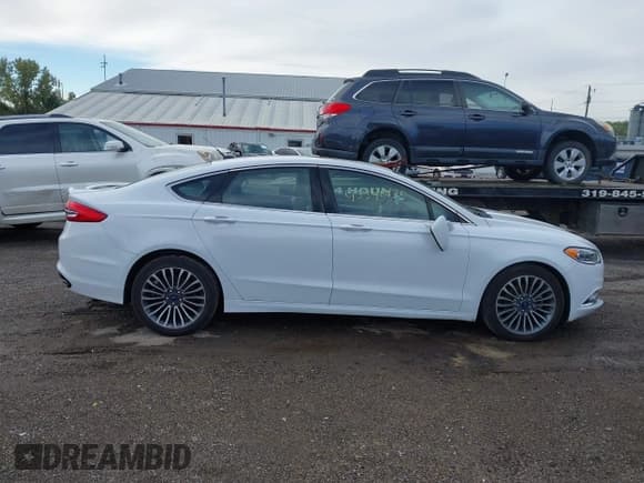 ✅ 2018 Ford Fusion Titanium • VIN: 3FA6P0D96JR188514 • Lot: 43390135. Listed on IAAI with 115,058 mi. Free auction sales archive from the USA and detailed vehicle history report at DreamBid. Image 13.