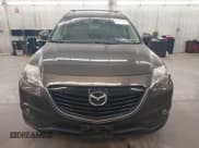 ✅ 2015 Mazda CX-9 Grand Touring • VIN: JM3TB3DA0F0464448 • Лот: 42385026. Опубликован ранее на IAAI с пробегом 118 203 миль. Бесплатный доступ к архиву аукционных продаж из США и подробный отчёт об истории автомобиля на DreamBid. Изображение 13.