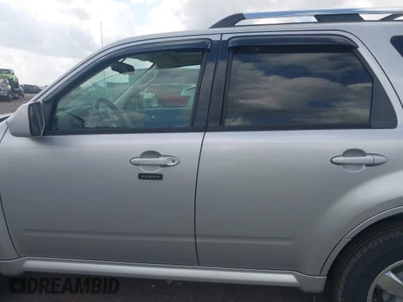 ✅ 2011 Mercury Mariner Premier • VIN: 4M2CN8H79BKJ02879 • Lot: 41961370. Listed on IAAI with 161,793 mi. Free auction sales archive from the USA and detailed vehicle history report at DreamBid. Image 13.