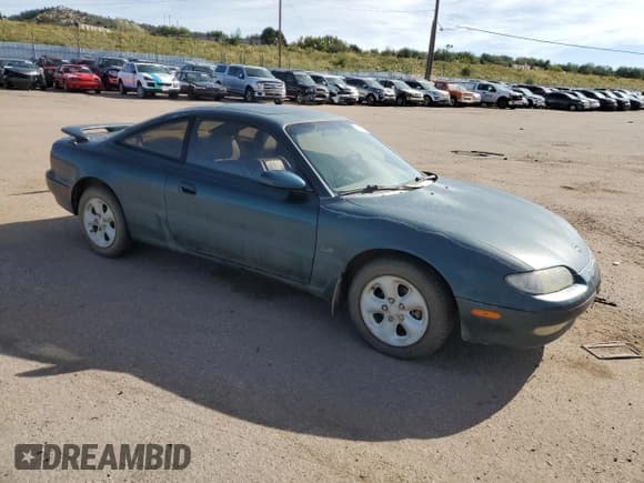 ✅ 1994 Mazda MX-6 • VIN: 1YVGE31D9R5183962 • Lot: 73097704. Wystawiony na Copart z przebiegiem 193 921 mil. Bezpłatny archiwum sprzedaży aukcyjnych z USA i szczegółowy raport historii pojazdu na DreamBid. Zdjęcie 4.