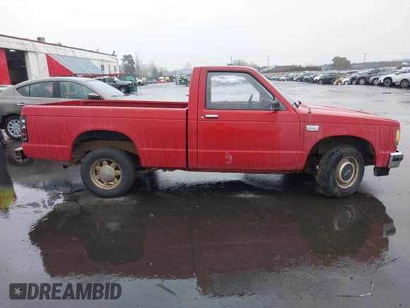 ✅ 1988 Chevrolet S-10 • VIN: 1GCBS14E0J2163624 • Лот: 41592499. Опубликован ранее на IAAI с пробегом 163 143 миль. Бесплатный доступ к архиву аукционных продаж из США и подробный отчёт об истории автомобиля на DreamBid. Изображение 13.