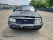 ✅ 2005 Ford Police Interceptor • VIN: 2FAFP71W05X102723 • Lot: 60533915. Wystawiony na Copart z przebiegiem 247 474 mil. Bezpłatny archiwum sprzedaży aukcyjnych z USA i szczegółowy raport historii pojazdu na DreamBid. Zdjęcie 5.