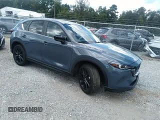 ✅ 2025 Mazda CX-5 S Carbon Edition • VIN: JM3KFBCM2S0682536 • Лот: 43105577. Опубликован ранее на IAAI с пробегом 3 871 миль. Бесплатный доступ к архиву аукционных продаж из США и подробный отчёт об истории автомобиля на DreamBid. Изображение 1.
