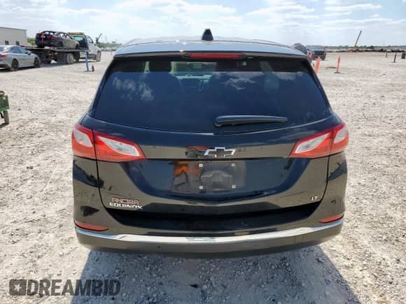 2020 Chevrolet Equinox LT с VIN 3GNAXKEV9LL267202, выставлен на аукционе Copart как лот 84652685 с пробегом 133 893 миль миль и Списание • Salvage title. История ставок и продаж доступна на DreamBid. Изображение 6.