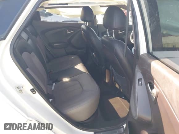 2012 Hyundai Tucson GLS z VIN KM8JU3AC3CU461964, wystawiony jako IAAI lot #43511864 z przebiegiem 113 173 mil mil oraz . Historia ofert i sprzedaży dostępna na DreamBid. Obrazek 8.