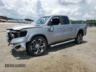 2020 Ram 1500 Laramie с VIN 1C6RREDT9LN152355, выставлен на аукционе Copart как лот 66853625 с пробегом 176 795 миль миль и Списание • Salvage title. История ставок и продаж доступна на DreamBid. Изображение 1.