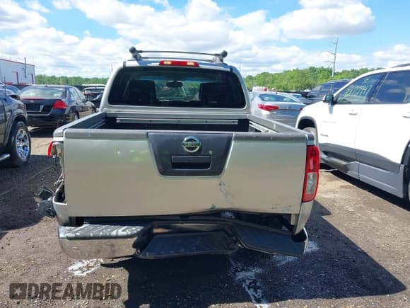 ✅ 2011 Nissan Frontier Pro-4X • VIN: 1N6AD0EV0BC408218 • Lot: 42187823. Listed on IAAI with 165,995 mi. Free auction sales archive from the USA and detailed vehicle history report at DreamBid. Image 16.
