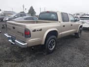 ✅ 2004 Dodge Dakota SLT • VIN: 1D7HG48NX4S596370 • Lot: 41760565. Listed on IAAI with 232,409 mi. Free auction sales archive from the USA and detailed vehicle history report at DreamBid. Image 4.