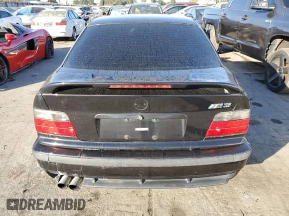 1998 BMW 3 Series M3s with VIN WBSCD932XWEE08919, listed as a Copart auction lot 84434704 with Not provided miles and Salvage title. Bid and sale history available at DreamBid. Image 6.