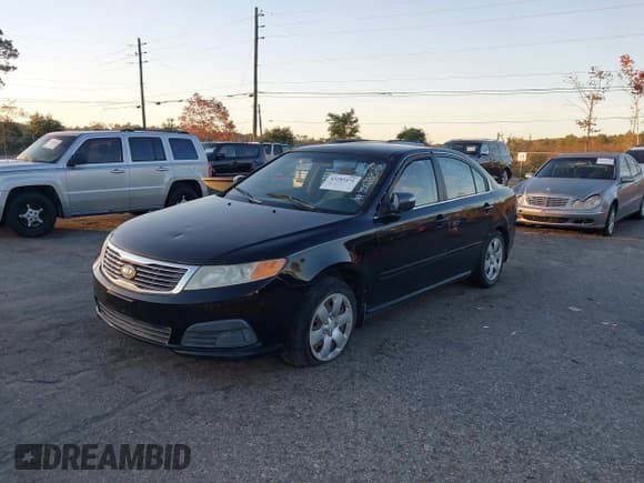 ✅ 2009 Kia Optima LX • VIN: KNAGE228195350233 • Lot: 43285471. Wystawiony na IAAI z przebiegiem Nie podano. Bezpłatny archiwum sprzedaży aukcyjnych z USA i szczegółowy raport historii pojazdu na DreamBid. Zdjęcie 2.