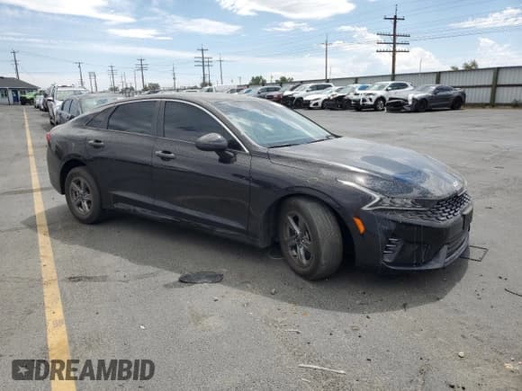 ✅ 2023 Kia K5 LXS • VIN: 5XXG14J23PG215464 • Lot: 67605575. Listed on Copart with 31,852 mi. Free auction sales archive from the USA and detailed vehicle history report at DreamBid. Image 4.