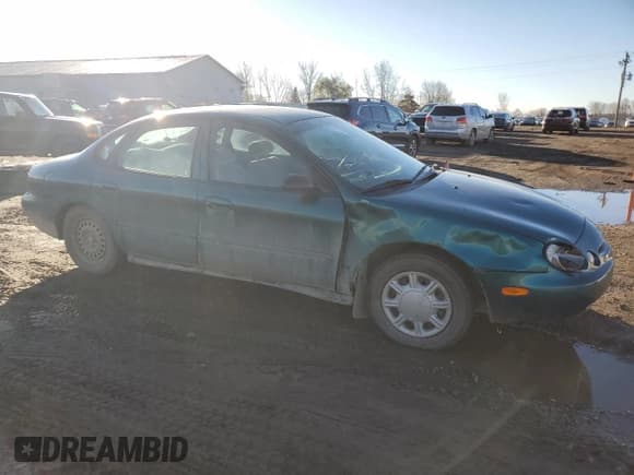 ✅ 1997 Ford Taurus G • VIN: 1FALP51U4VG297298 • Лот: 79660284. Опубликован ранее на Copart с пробегом 115 038 миль. Бесплатный доступ к архиву аукционных продаж из США и подробный отчёт об истории автомобиля на DreamBid. Изображение 4.