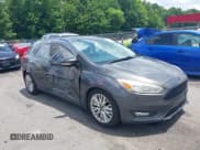 ✅ 2016 Ford Focus Titanium • VIN: 1FADP3N20GL275763 • Лот: 42511959. Опубликован ранее на IAAI с пробегом 124 891 миль. Бесплатный доступ к архиву аукционных продаж из США и подробный отчёт об истории автомобиля на DreamBid. Изображение 1.
