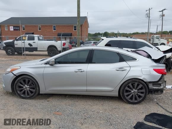 ✅ 2013 Hyundai Azera • VIN: KMHFH4JG9DA247602 • Лот: 43310653. Опубликован ранее на IAAI с пробегом 228 911 миль. Бесплатный доступ к архиву аукционных продаж из США и подробный отчёт об истории автомобиля на DreamBid. Изображение 14.