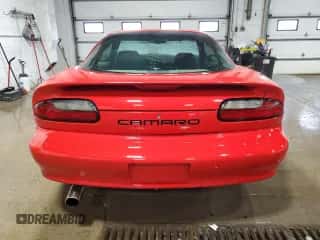 1994 Chevrolet Camaro z VIN 2G1FP22S0R2105030, wystawiony jako Copart lot #45131955 z przebiegiem 166 107 mil mil oraz Czysty tytuł • Clean title. Historia ofert i sprzedaży dostępna na DreamBid. Obrazek 6.