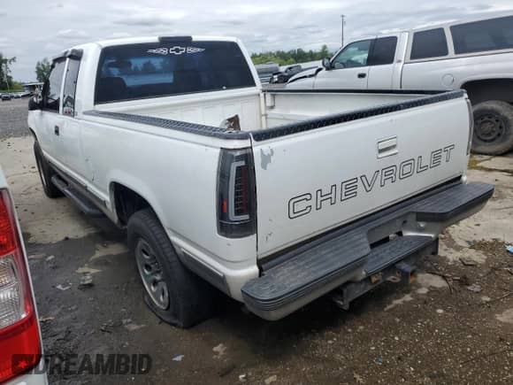 1999 Chevrolet Silverado 1500 with VIN 1GCEK19R2XR116510, listed as a Copart auction lot 50011045 with 174,401 mi miles and Salvage title. Bid and sale history available at DreamBid. Image 2.
