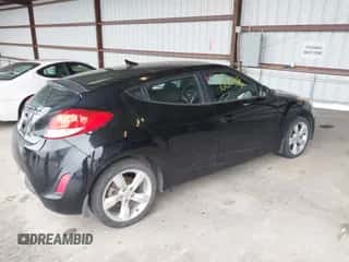 2013 Hyundai Veloster w/Black Int with VIN KMHTC6AD3DU160506, listed as a IAAI auction lot 43547188 with 174,692 mi miles and . Bid and sale history available at DreamBid. Image 4.