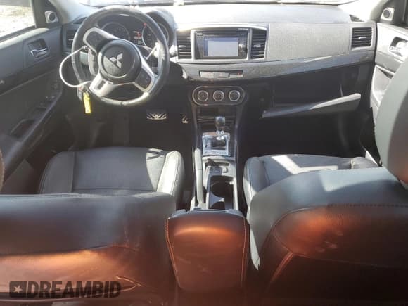 ✅ 2015 Mitsubishi Lancer Evolution MR • VIN: JA32W5FV2FU010441 • Lot: 58816275. Wystawiony na Copart z przebiegiem 72 531 mil. Bezpłatny archiwum sprzedaży aukcyjnych z USA i szczegółowy raport historii pojazdu na DreamBid. Zdjęcie 8.