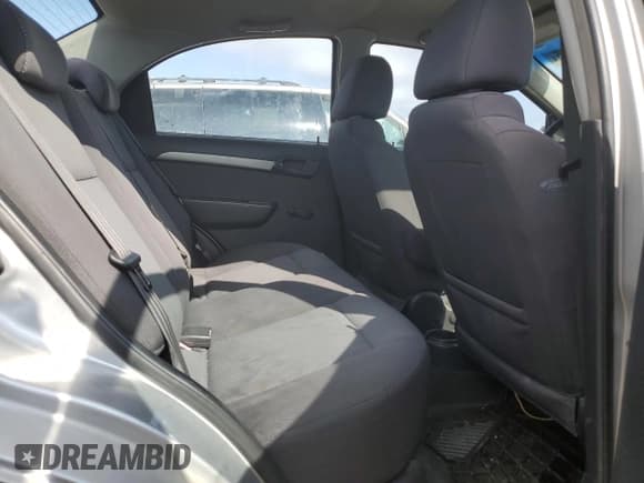 ✅ 2009 Chevrolet Aveo 1LT • VIN: KL1TD56E49B354887 • Lot: 44033545. Wystawiony na Copart z przebiegiem 127 744 mil. Bezpłatny archiwum sprzedaży aukcyjnych z USA i szczegółowy raport historii pojazdu na DreamBid. Zdjęcie 10.