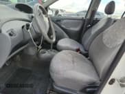 ✅ 2002 Toyota ECHO • VIN: JTDBT123320220409 • Lot: 84297355. Wystawiony na Copart z przebiegiem 165 592 mil. Bezpłatny archiwum sprzedaży aukcyjnych z USA i szczegółowy raport historii pojazdu na DreamBid. Zdjęcie 7.