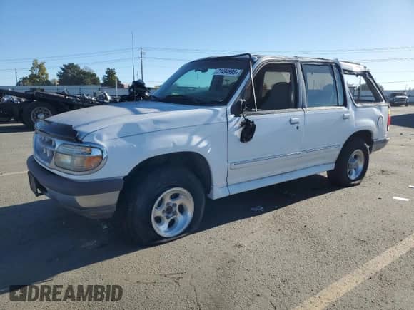 1997 Ford Explorer XL with VIN 1FMDU34X1VUA60041, listed as a Copart auction lot 71494695 with 176,515 mi miles and Clean title. Bid and sale history available at DreamBid. Image 1.