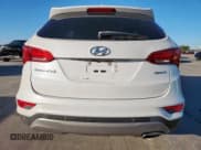 ✅ 2017 Hyundai Santa Fe 2.4L • VIN: 5XYZU3LB8HG410979 • Lot: 90727745. Wystawiony na Copart z przebiegiem 89 970 mil. Bezpłatny archiwum sprzedaży aukcyjnych z USA i szczegółowy raport historii pojazdu na DreamBid. Zdjęcie 6.