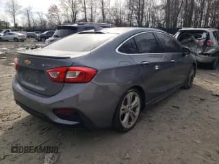 ✅ 2018 Chevrolet Cruze Premier • VIN: 1G1BF5SM5J7156010 • Lot: 46577323. Listed on Copart with 107,132 mi. Free auction sales archive from the USA and detailed vehicle history report at DreamBid. Image 3.