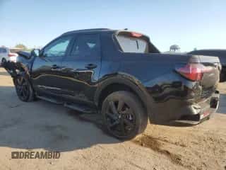2024 Hyundai Santa Cruz Night Edition с VIN 5NTJCDDF7RH102110, выставлен на аукционе Copart как лот 75322214 с пробегом Не указан миль и Списание • Salvage title. История ставок и продаж доступна на DreamBid. Изображение 2.