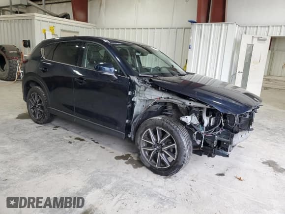 ✅ 2017 Mazda CX-5 Grand Touring • VIN: JM3KFBDL0H0160910 • Лот: 92841545. Опубликован ранее на Copart с пробегом 110 487 миль. Бесплатный доступ к архиву аукционных продаж из США и подробный отчёт об истории автомобиля на DreamBid. Изображение 4.