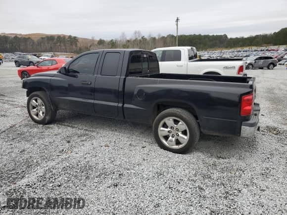 2006 Dodge Dakota SLT z VIN 1D7HE42N16S702822, wystawiony jako Copart lot #44034175 z przebiegiem 141 509 mil mil oraz Szkoda całkowita • Salvage title. Historia ofert i sprzedaży dostępna na DreamBid. Obrazek 2.