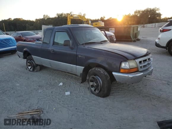 ✅ 2000 Ford Ranger XL • VIN: 1FTYR14V4YPA71001 • Lot: 92236845. Listed on Copart with Not provided. Free auction sales archive from the USA and detailed vehicle history report at DreamBid. Image 4.
