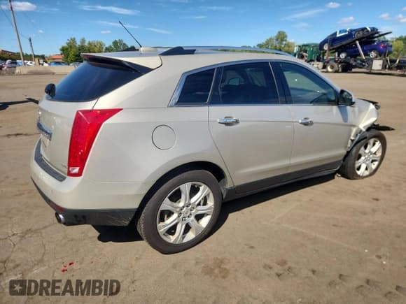 ✅ 2015 Cadillac SRX Premium Collection • VIN: 3GYFNGE38FS547147 • Lot: 70882935. Wystawiony na Copart z przebiegiem 160 153 mil. Bezpłatny archiwum sprzedaży aukcyjnych z USA i szczegółowy raport historii pojazdu na DreamBid. Zdjęcie 3.
