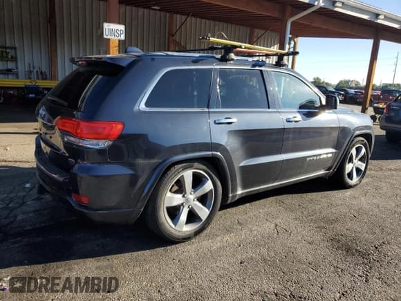 ✅ 2014 Jeep Grand Cherokee Overland • VIN: 1C4RJFCG9EC431684 • Lot: 84038665. Listed on Copart with 140,795 mi. Free auction sales archive from the USA and detailed vehicle history report at DreamBid. Image 3.