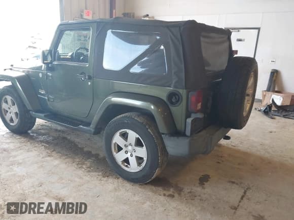 ✅ 2007 Jeep Wrangler Sahara • VIN: 1J4FA54187L125547 • Lot: 43487962. Listed on IAAI with 187,902 mi. Free auction sales archive from the USA and detailed vehicle history report at DreamBid. Image 3.