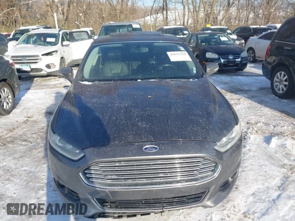 ✅ 2016 Ford Fusion Titanium • VIN: 3FA6P0K96GR300806 • Lot: 43837326. Listed on IAAI with 229,915 mi. Free auction sales archive from the USA and detailed vehicle history report at DreamBid. Image 12.
