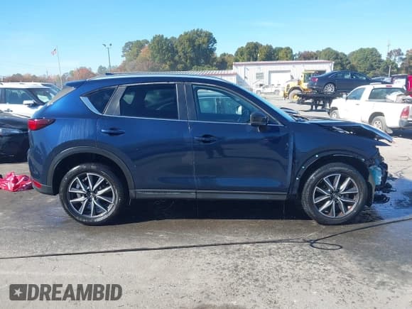 ✅ 2018 Mazda CX-5 Touring • VIN: JM3KFBCM4J0351052 • Lot: 43574119. Wystawiony na IAAI z przebiegiem 118 096 mil. Bezpłatny archiwum sprzedaży aukcyjnych z USA i szczegółowy raport historii pojazdu na DreamBid. Zdjęcie 14.