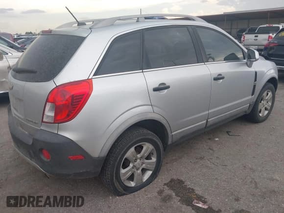 ✅ 2015 Chevrolet Captiva Sport LS • VIN: 3GNAL2EK8FS519825 • Лот: 43102487. Опубликован ранее на IAAI с пробегом 156 499 миль. Бесплатный доступ к архиву аукционных продаж из США и подробный отчёт об истории автомобиля на DreamBid. Изображение 4.