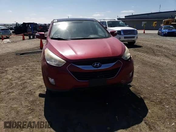 2010 Hyundai Tucson Limited z VIN KM8JU3AC4AU011933, wystawiony jako Copart lot #69219584 z przebiegiem 158 618 mil mil oraz Szkoda całkowita • Salvage title. Historia ofert i sprzedaży dostępna na DreamBid. Obrazek 11.