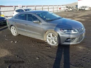 ✅ 2014 Volkswagen CC Sport • VIN: WVWBP7AN1EE527482 • Lot: 41668039. Wystawiony na IAAI z przebiegiem 123 554 mil. Bezpłatny archiwum sprzedaży aukcyjnych z USA i szczegółowy raport historii pojazdu na DreamBid. Zdjęcie 1.