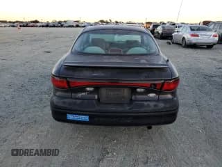 ✅ 1998 Ford Escort • VIN: 3FALP1131WR101490 • Lot: 74065584. Wystawiony na Copart z przebiegiem 144 659 mil. Bezpłatny archiwum sprzedaży aukcyjnych z USA i szczegółowy raport historii pojazdu na DreamBid. Zdjęcie 6.