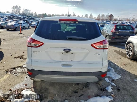 ✅ 2014 Ford Escape SE • VIN: 1FMCU9G9XEUD73181 • Lot: 95706155. Listed on Copart with 104,492 mi. Free auction sales archive from the USA and detailed vehicle history report at DreamBid. Image 6.
