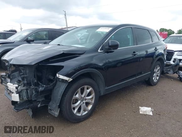 ✅ 2015 Mazda CX-9 Sport • VIN: JM3TB3BV1F0466070 • Lot: 42350686. Listed on IAAI with 110,818 mi. Free auction sales archive from the USA and detailed vehicle history report at DreamBid. Image 2.