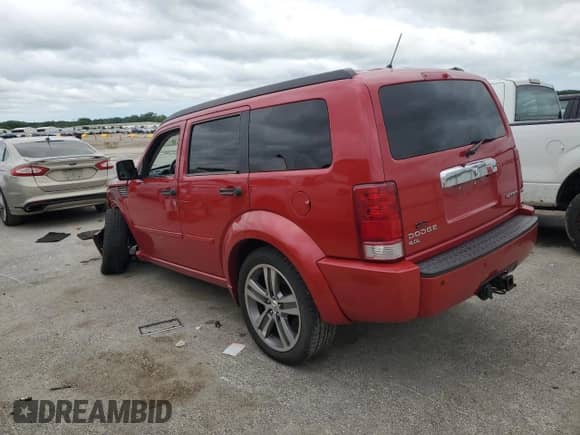 2011 Dodge Nitro Shock with VIN 1D4PT7GX7BW576298, listed as a Copart auction lot 62912865 with 125,517 mi miles and Salvage title. Bid and sale history available at DreamBid. Image 2.