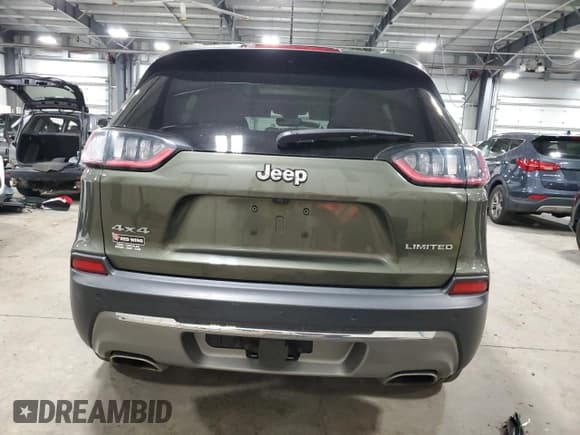 ✅ 2019 Jeep Cherokee Limited • VIN: 1C4PJMDX4KD330052 • Lot: 91004545. Listed on Copart with 180,533 mi. Free auction sales archive from the USA and detailed vehicle history report at DreamBid. Image 6.