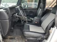 ✅ 2005 Jeep Wrangler X • VIN: 1J4FA39S55P353789 • Lot: 62469015. Wystawiony na Copart z przebiegiem 143 817 mil. Bezpłatny archiwum sprzedaży aukcyjnych z USA i szczegółowy raport historii pojazdu na DreamBid. Zdjęcie 7.