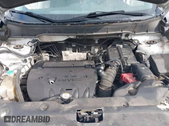 2014 Mitsubishi Outlander SE z VIN 4A4AP4AU6EE003514, wystawiony jako IAAI lot #43403657 z przebiegiem 183 838 mil mil oraz . Historia ofert i sprzedaży dostępna na DreamBid. Obrazek 10.