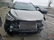 ✅ 2017 Hyundai Santa Fe 2.4L • VIN: 5NMZU3LB8HH032409 • Lot: 57939915. Listed on Copart with 105,494 mi. Free auction sales archive from the USA and detailed vehicle history report at DreamBid. Image 5.