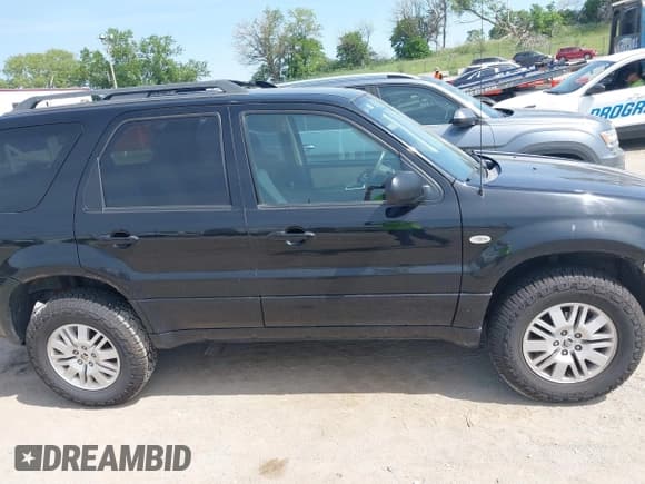 ✅ 2006 Mercury Mariner Convenience • VIN: 4M2YU56Z66KJ04591 • Лот: 42469116. Опубликован ранее на IAAI с пробегом 174 952 миль. Бесплатный доступ к архиву аукционных продаж из США и подробный отчёт об истории автомобиля на DreamBid. Изображение 14.