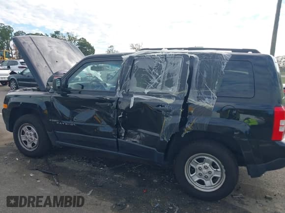 ✅ 2016 Jeep Patriot Sport SE • VIN: 1C4NJRBB3GD580126 • Lot: 43401890. Listed on IAAI with 281,192 mi. Free auction sales archive from the USA and detailed vehicle history report at DreamBid. Image 6.