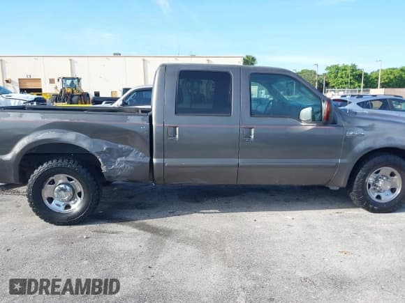 ✅ 2005 Ford F-250 XL • VIN: 1FTSW205X5EB37228 • Lot: 42370391. Listed on IAAI with 294,995 mi. Free auction sales archive from the USA and detailed vehicle history report at DreamBid. Image 6.